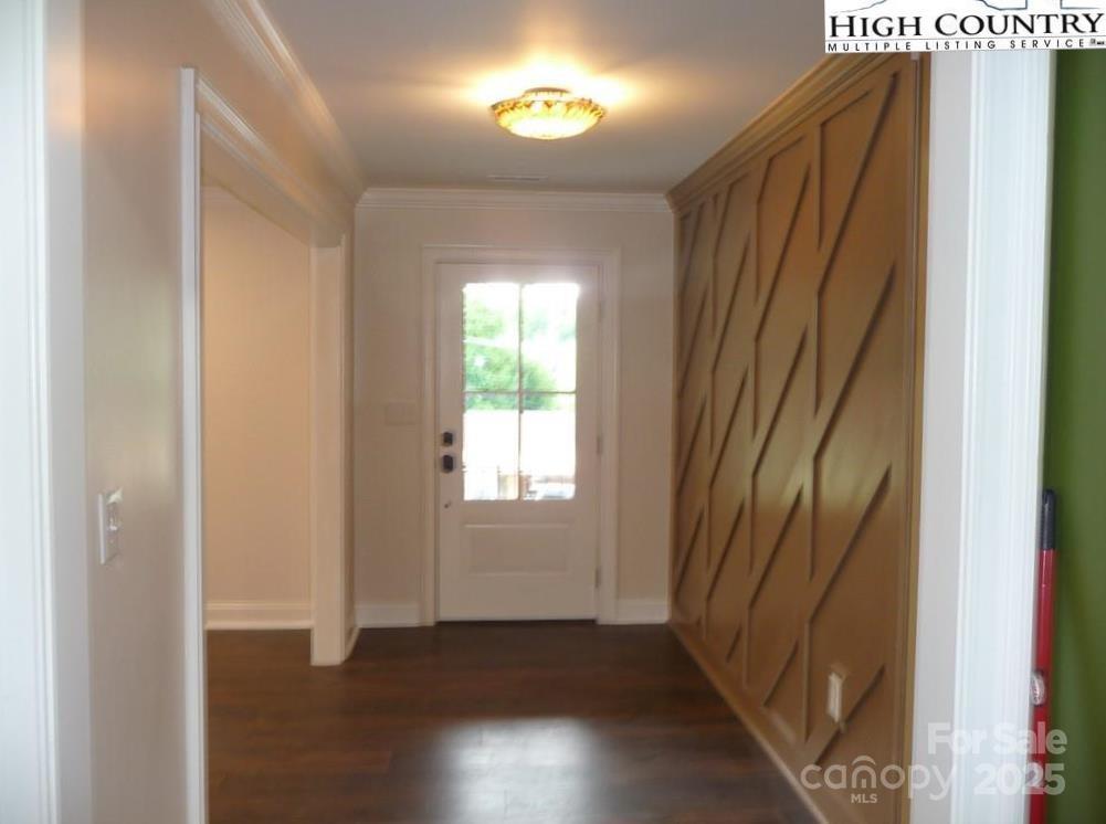 384 New River Heights Road, Unit 12 Boone, NC 28607 - Photo 4 of 30 a view of an empty room with wooden floor