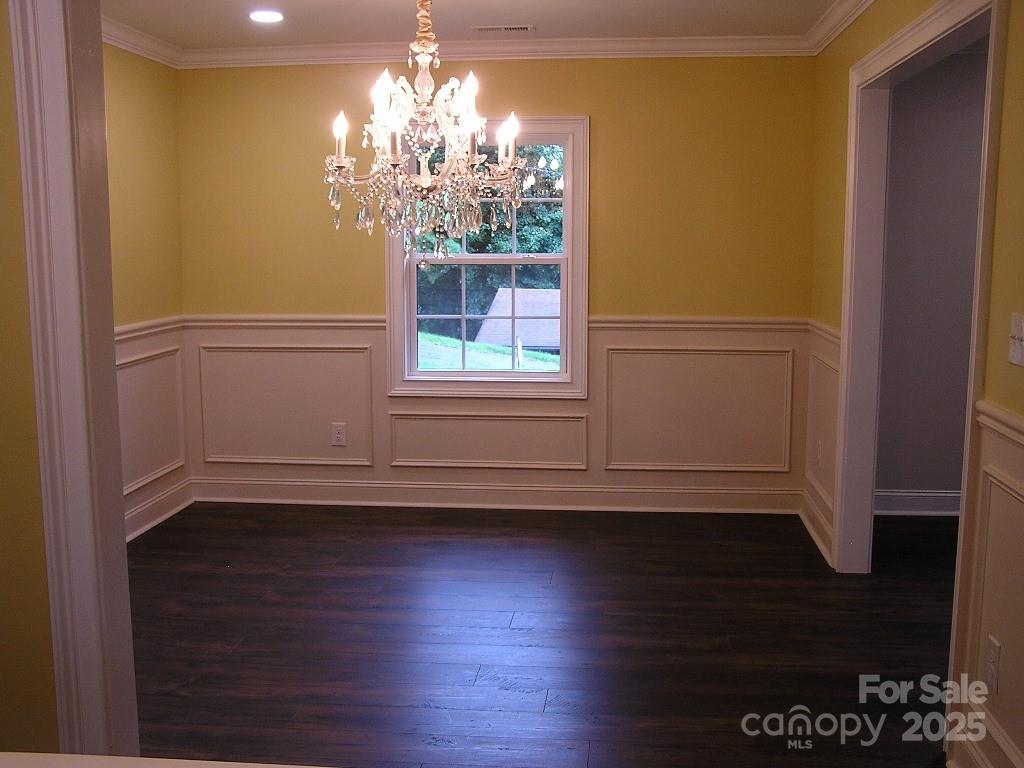 384 New River Heights Road, Unit 12 Boone, NC 28607 - Photo 7 of 30 a view of a room with wooden floor and window