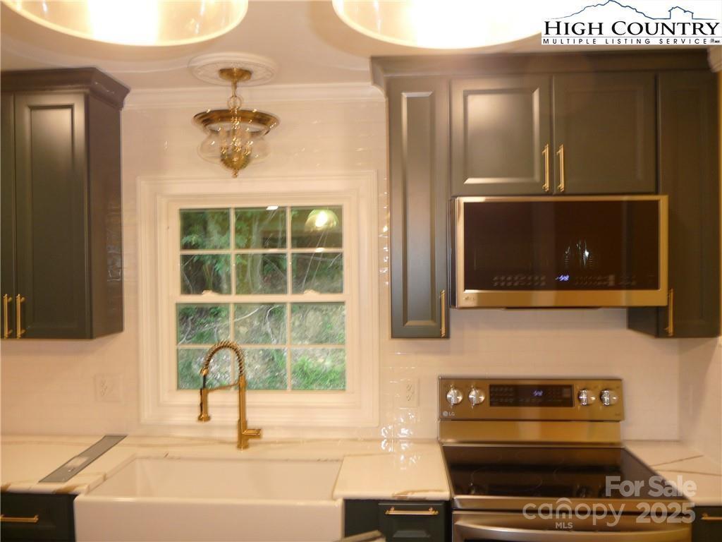 384 New River Heights Road, Unit 12 Boone, NC 28607 - Photo 9 of 30 a bathroom with a sink and a mirror