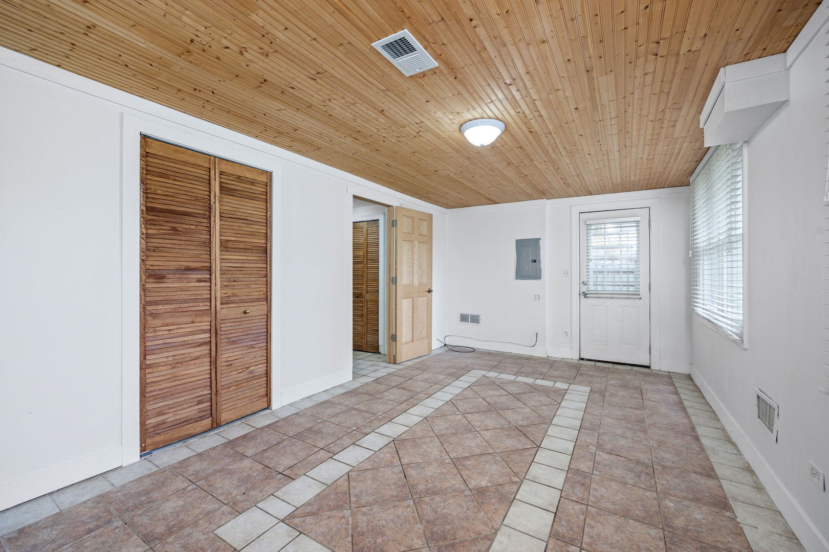 14 Deerpath Road Lake In The Hills, IL 60156 - Photo 21 of 30 a view of an empty room with window and stairs