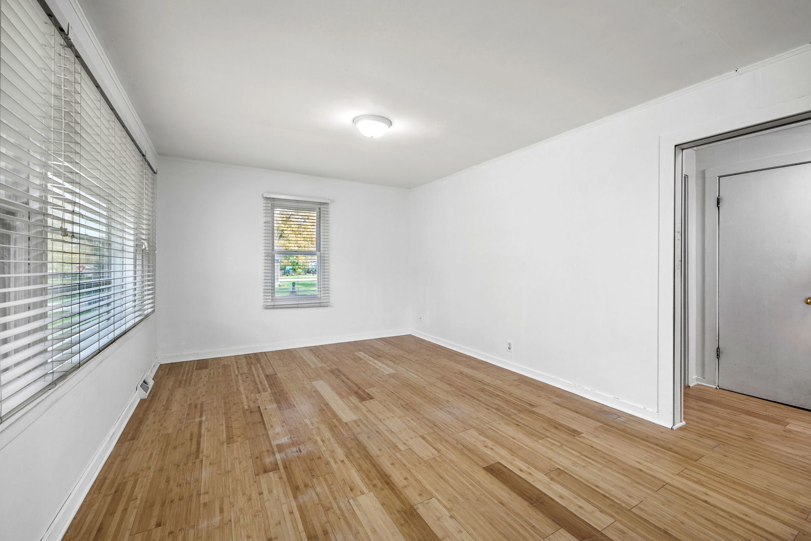 14 Deerpath Road Lake In The Hills, IL 60156 - Photo 4 of 30 a view of empty room with wooden floor and fan