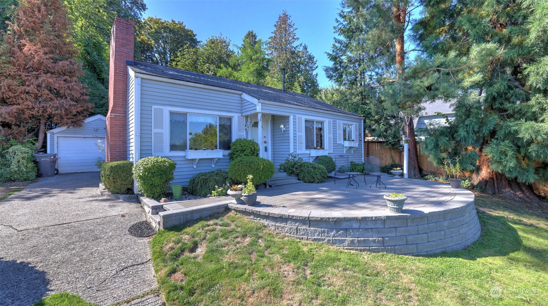 217 Hardie Avenue Southwest Renton, WA 98057 - Photo 1 of 29 a view of a house with backyard and sitting area