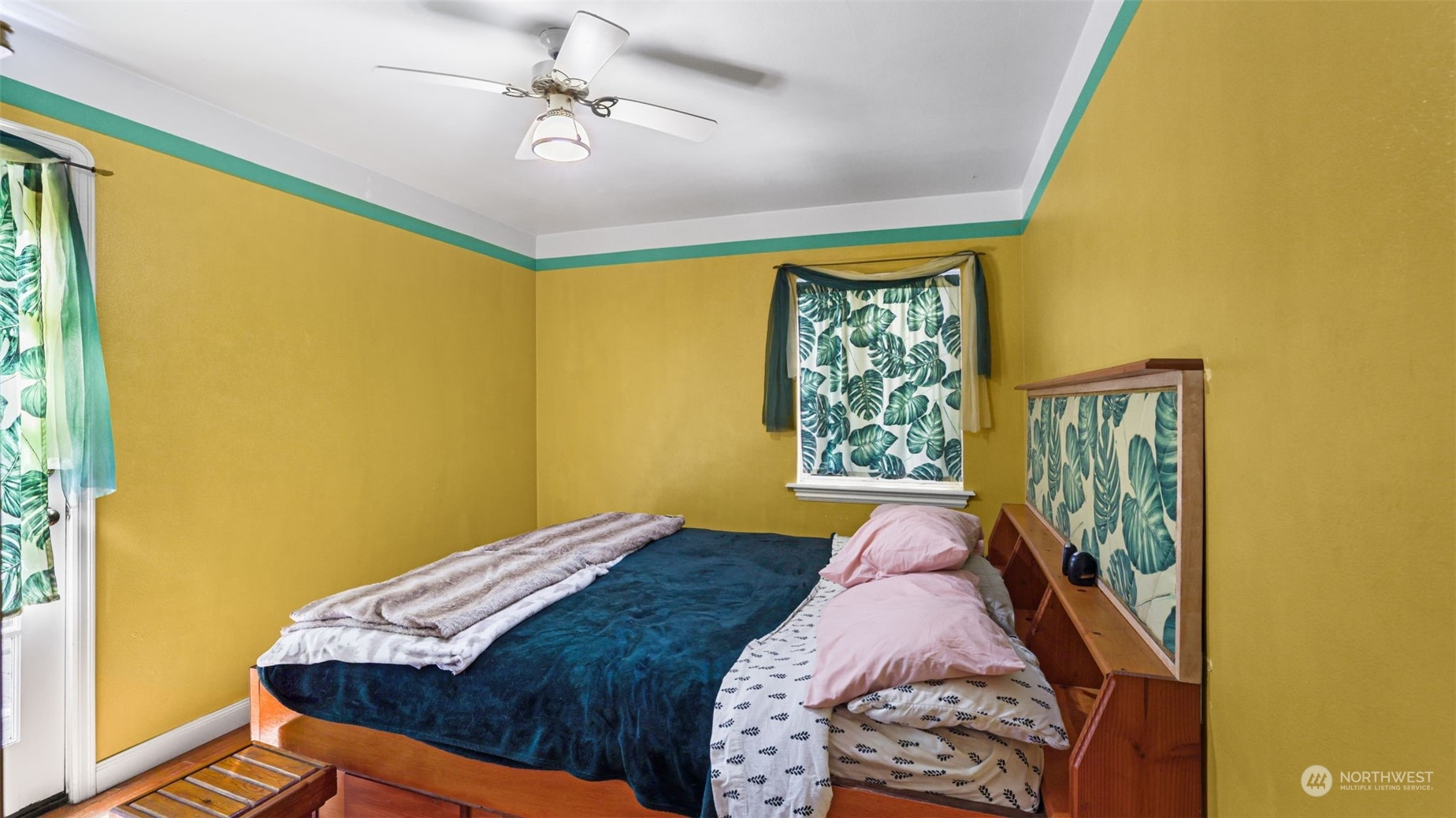 217 Hardie Avenue Southwest Renton, WA 98057 - Photo 14 of 29 a bedroom with a bed and a window