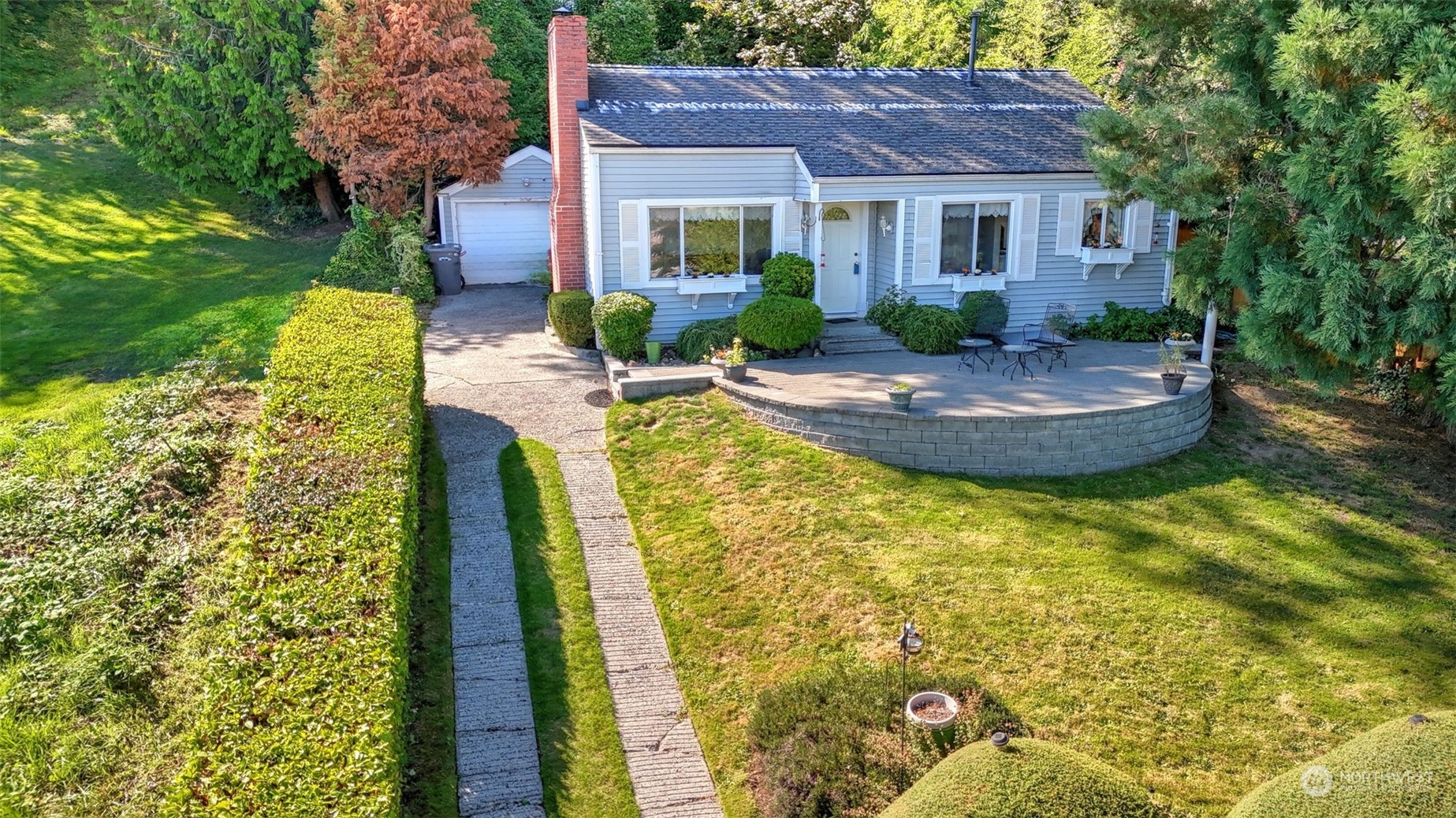 217 Hardie Avenue Southwest Renton, WA 98057 - Photo 2 of 29 a aerial view of a house with swimming pool garden and patio