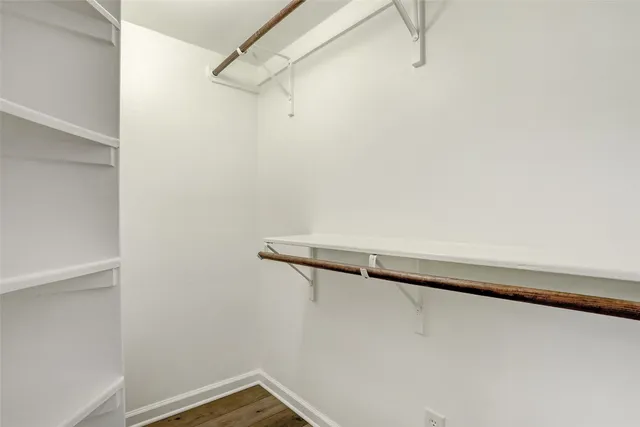a bathroom with a sink double vanity and a mirror