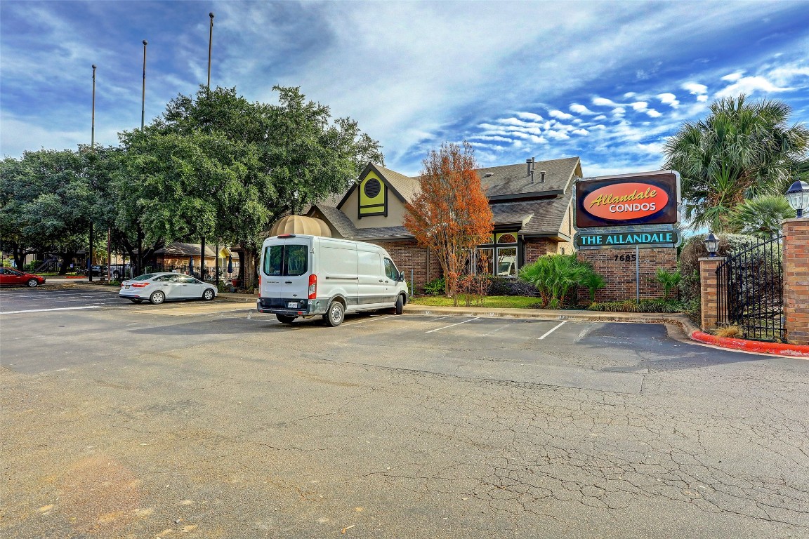7685 Northcross Drive, Unit 426 Austin, TX 78757 - Photo 27 of 35 a car parked in front of a building
