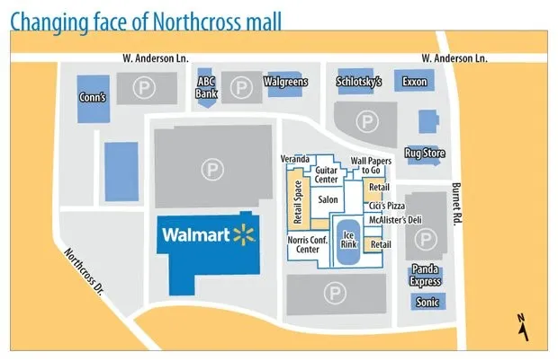 a view of road with parked cars