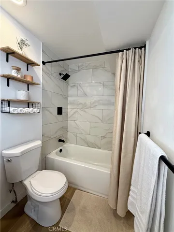 a kitchen with a table and chairs in it