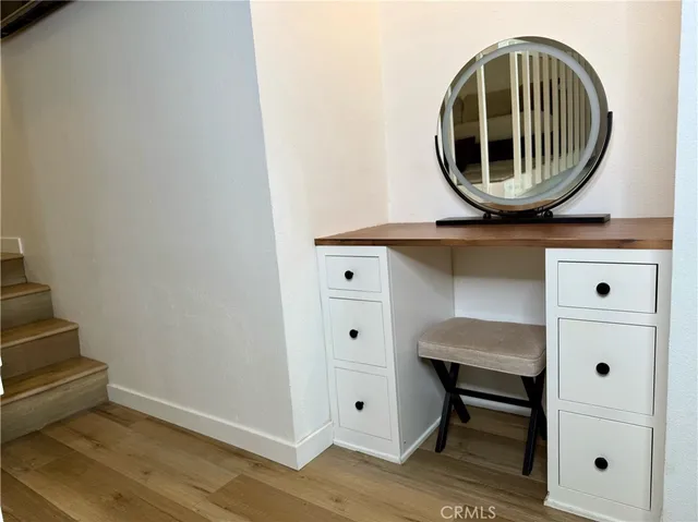 a kitchen with a table and chairs in it