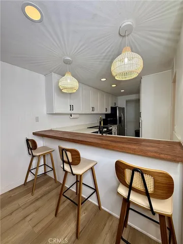 a view of a balcony and chairs