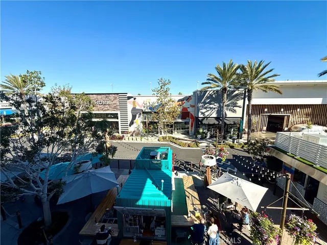 a view of a building with a yard