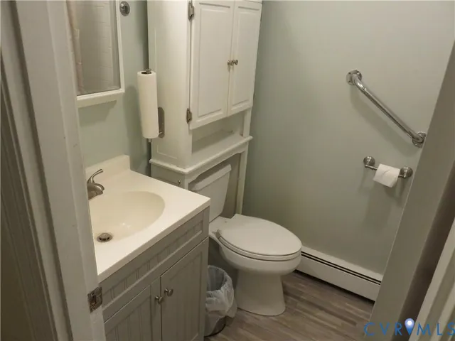 a kitchen with stainless steel appliances granite countertop a refrigerator and a stove