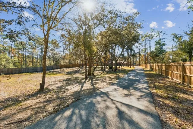 a view of a terrace with yard