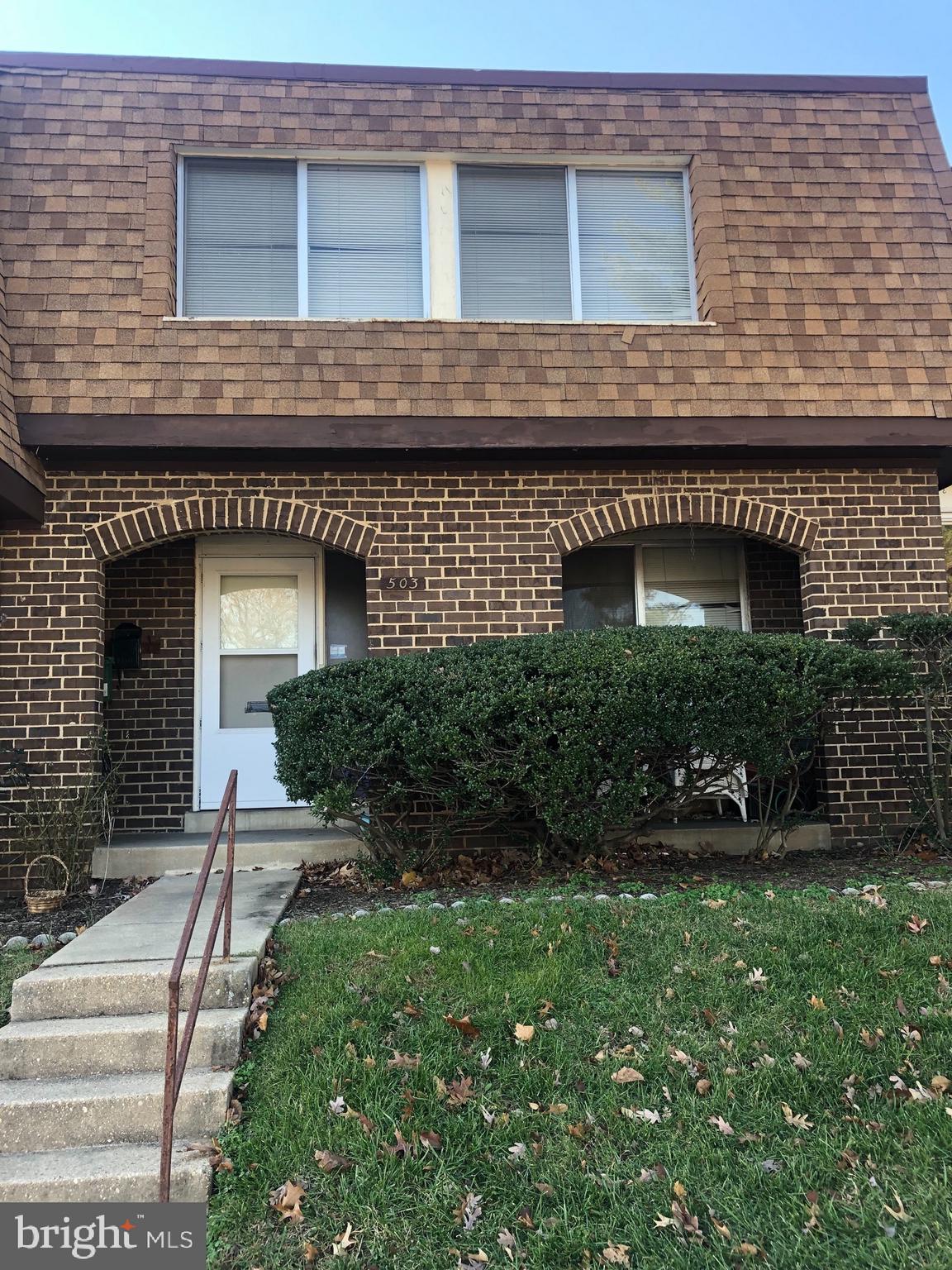 503 Summit Hall Road Gaithersburg, MD 20877 - Photo 1 of 1 a view of a house with a yard