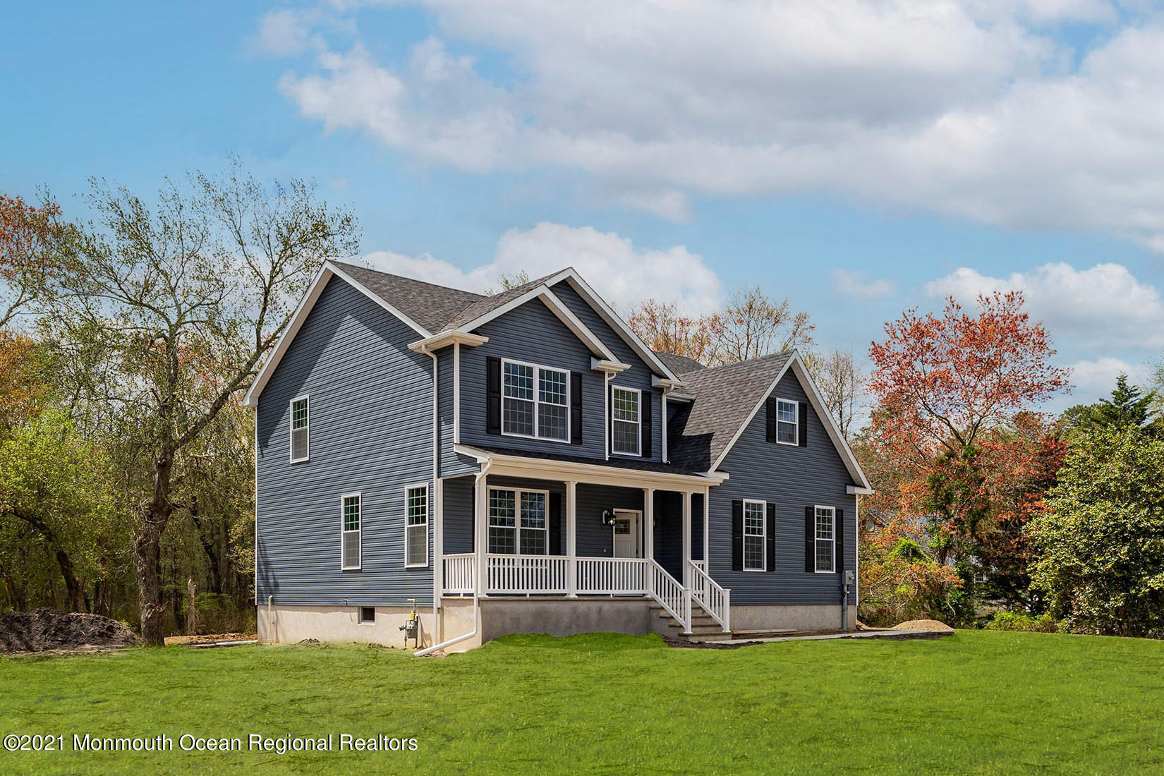 331 East Pleasant Grove Road Jackson, NJ 08527 - Photo 1 of 40 a front view of house with yard and green space