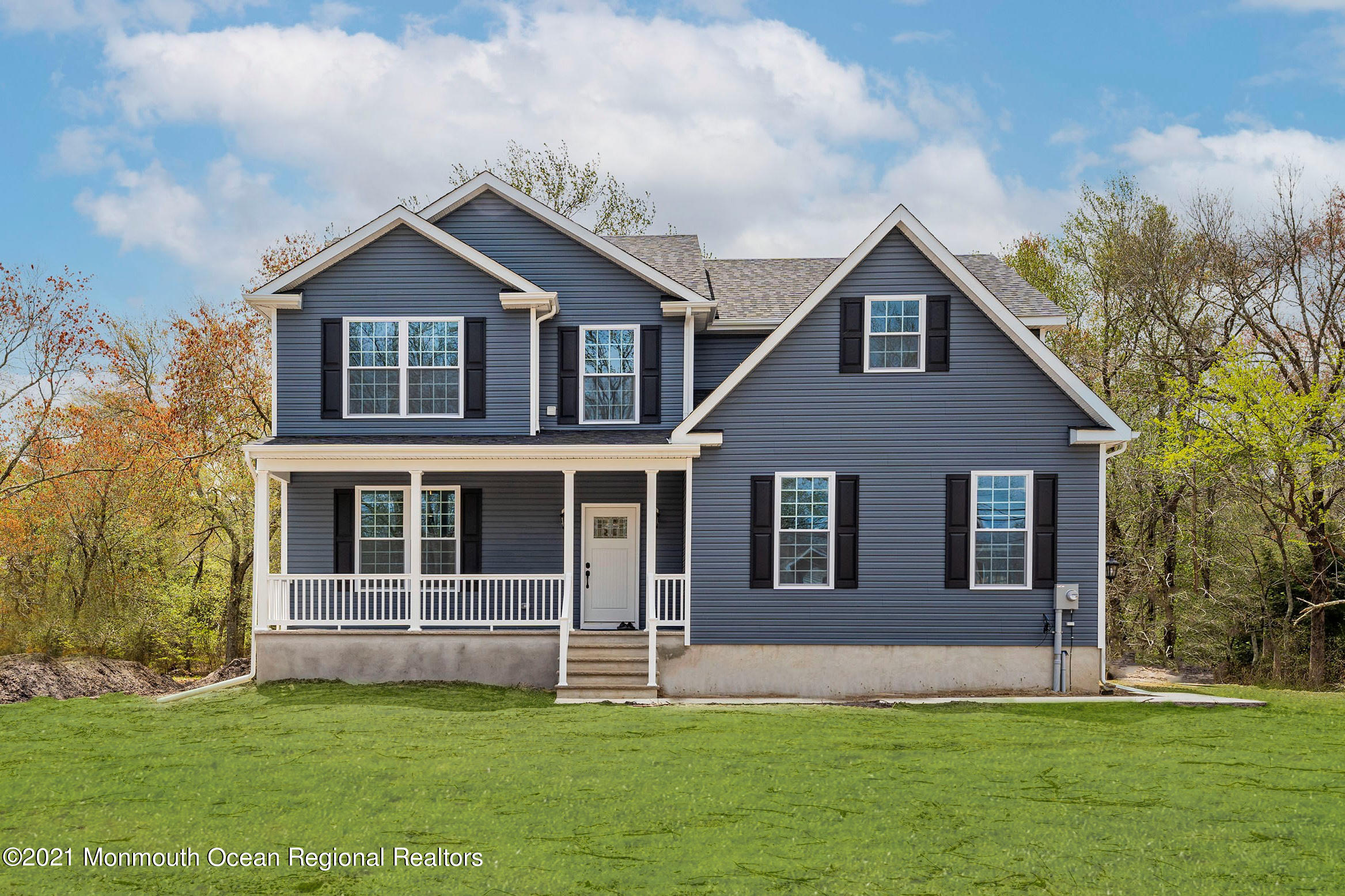 331 East Pleasant Grove Road Jackson, NJ 08527 - Photo 2 of 40 a front view of a house with a yard