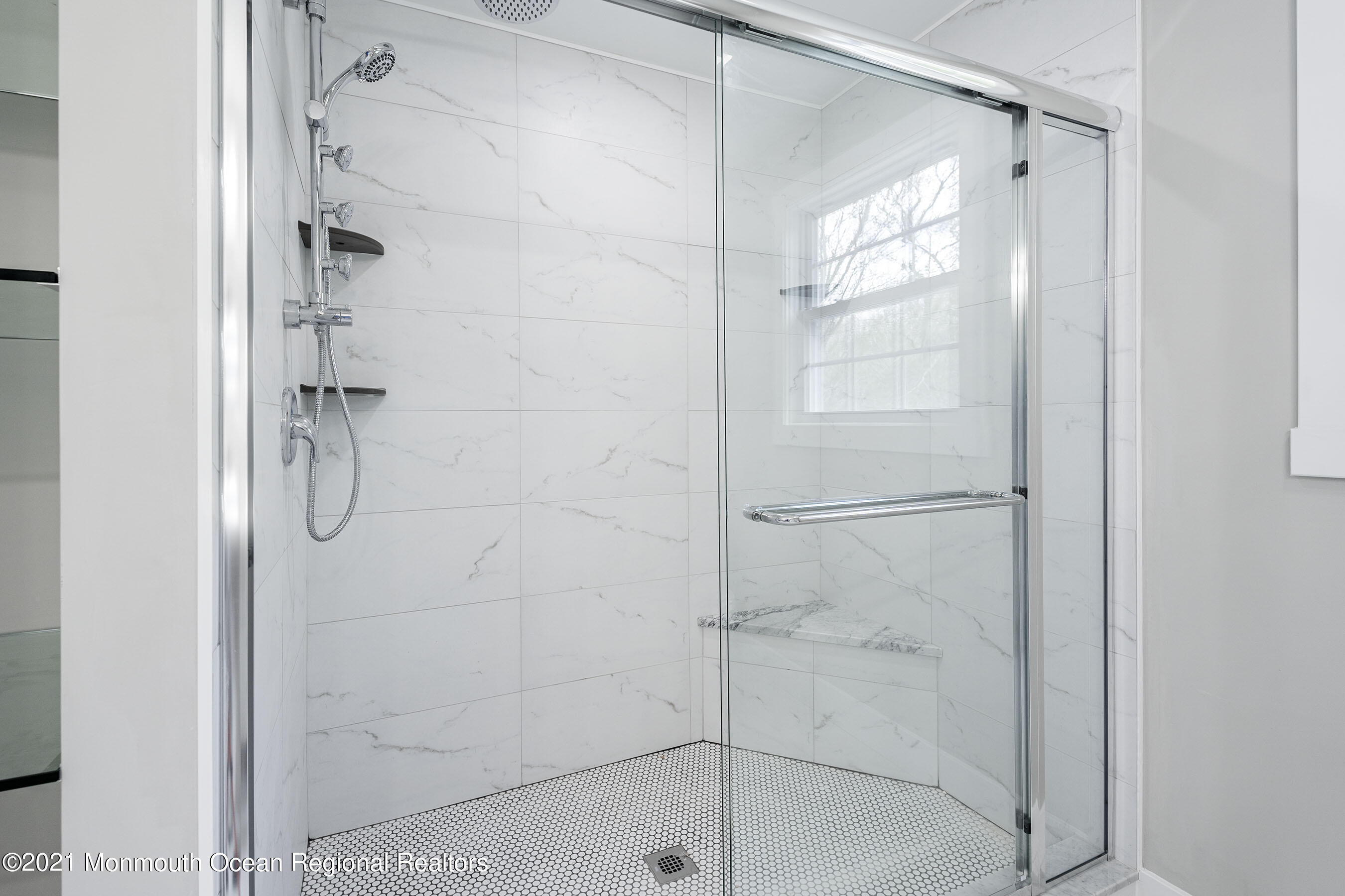 331 East Pleasant Grove Road Jackson, NJ 08527 - Photo 28 of 40 a bathroom with a glass shower door