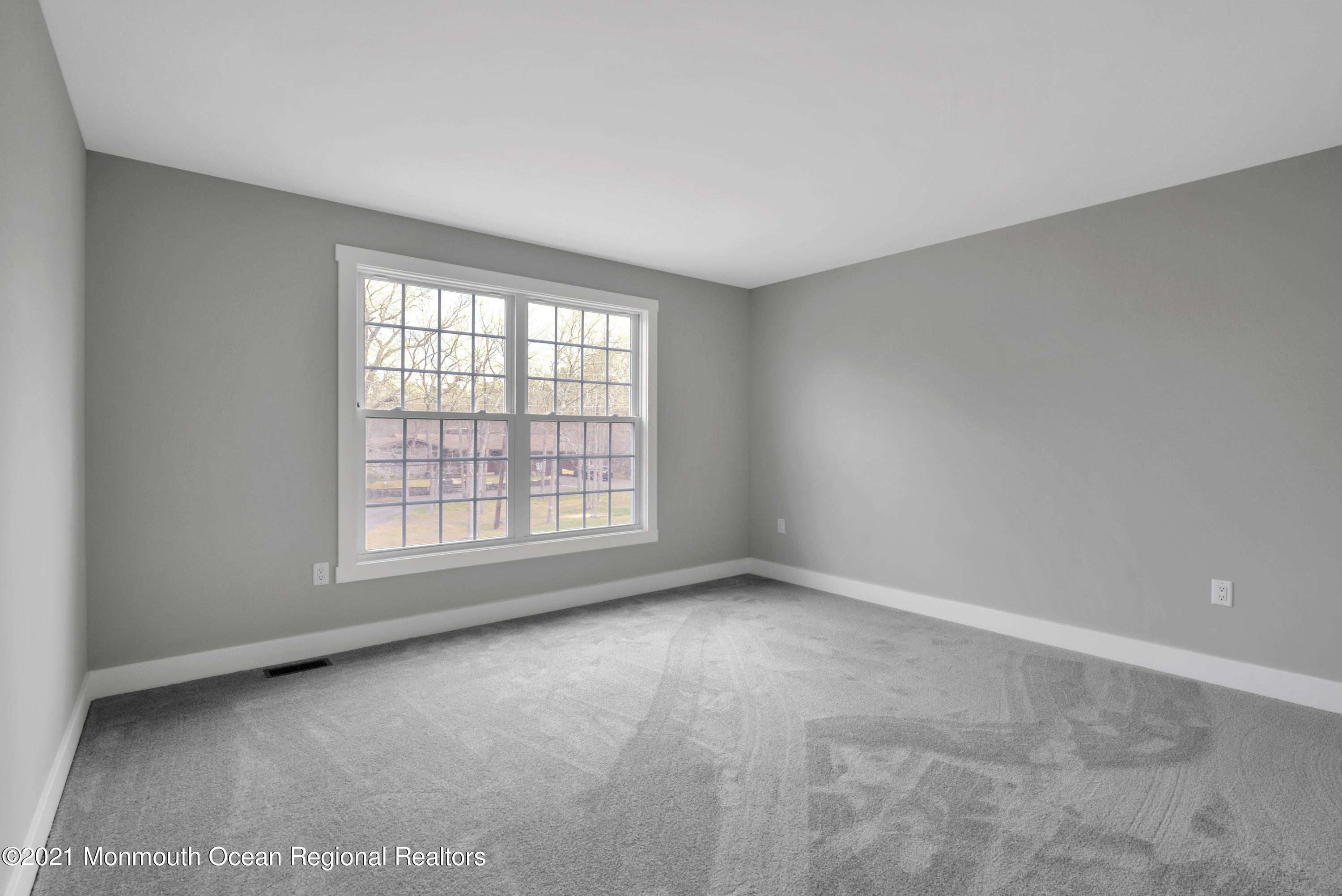 331 East Pleasant Grove Road Jackson, NJ 08527 - Photo 31 of 40 an empty room with a window