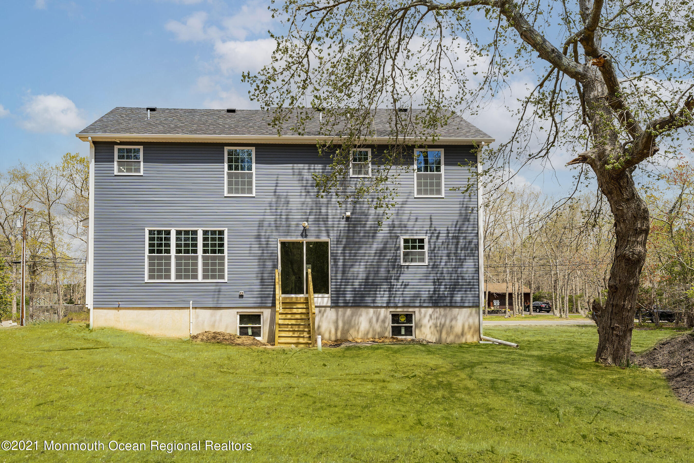 331 East Pleasant Grove Road Jackson, NJ 08527 - Photo 37 of 40 a view of a house with a yard