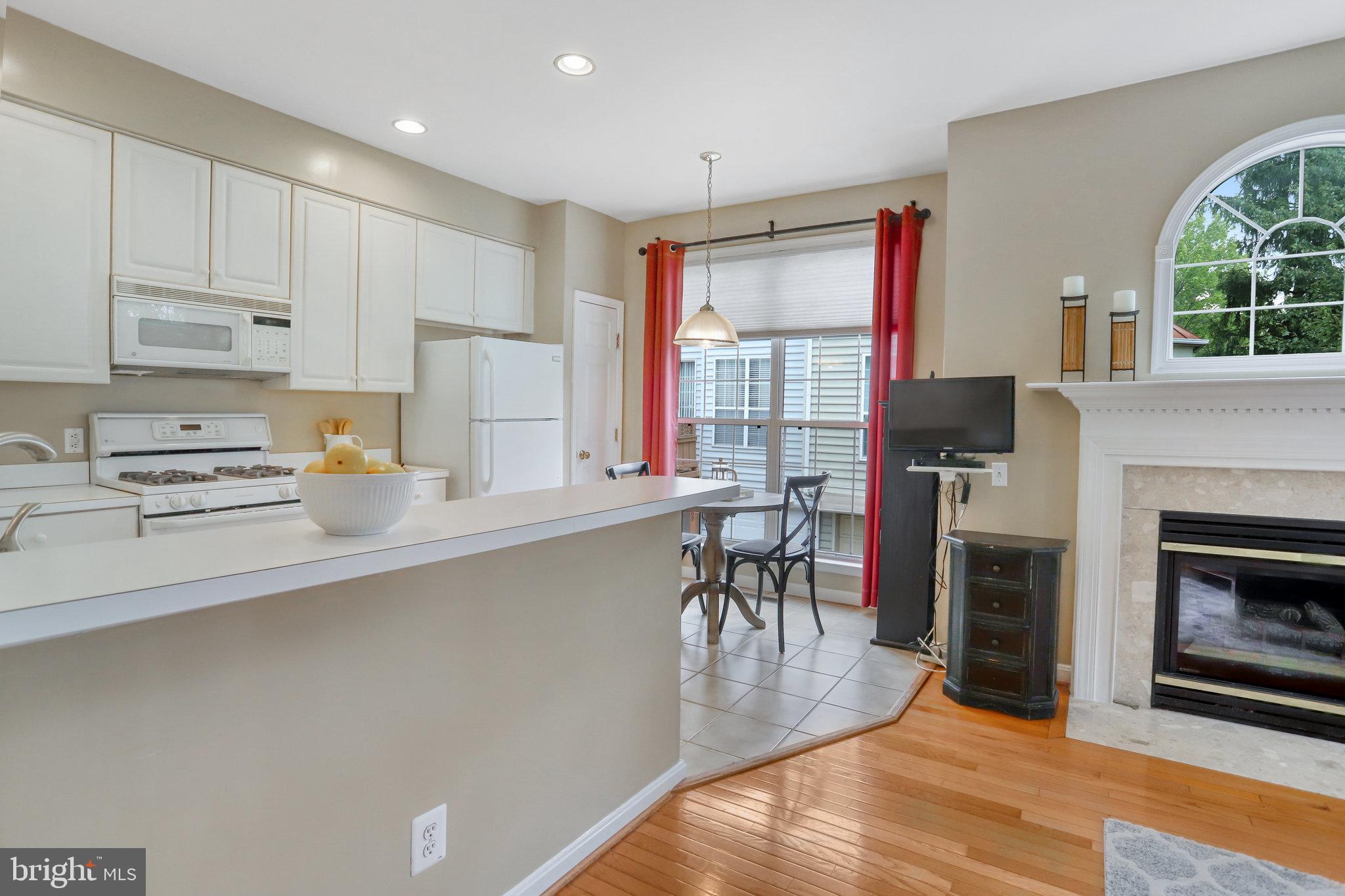 6001 Riddle Walk Alexandria, VA 22312 - Photo 20 of 85 Open Kitchen with Sitting Room and Gas FP