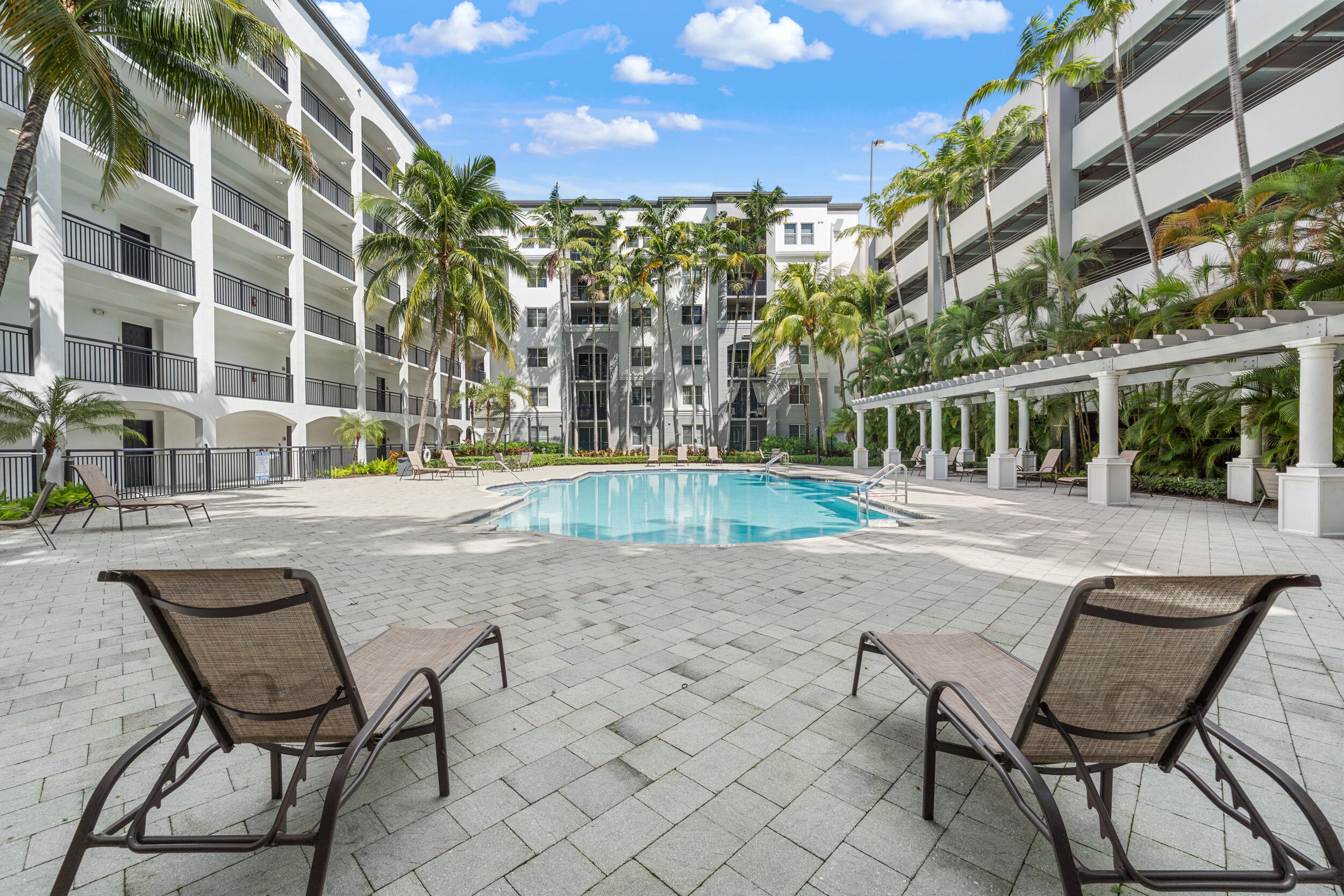 1690 Renaissance Commons Boulevard, Unit 1312 Boynton Beach, FL 33426 - Photo 23 of 44 31_vizcaya lakes - pool 01
