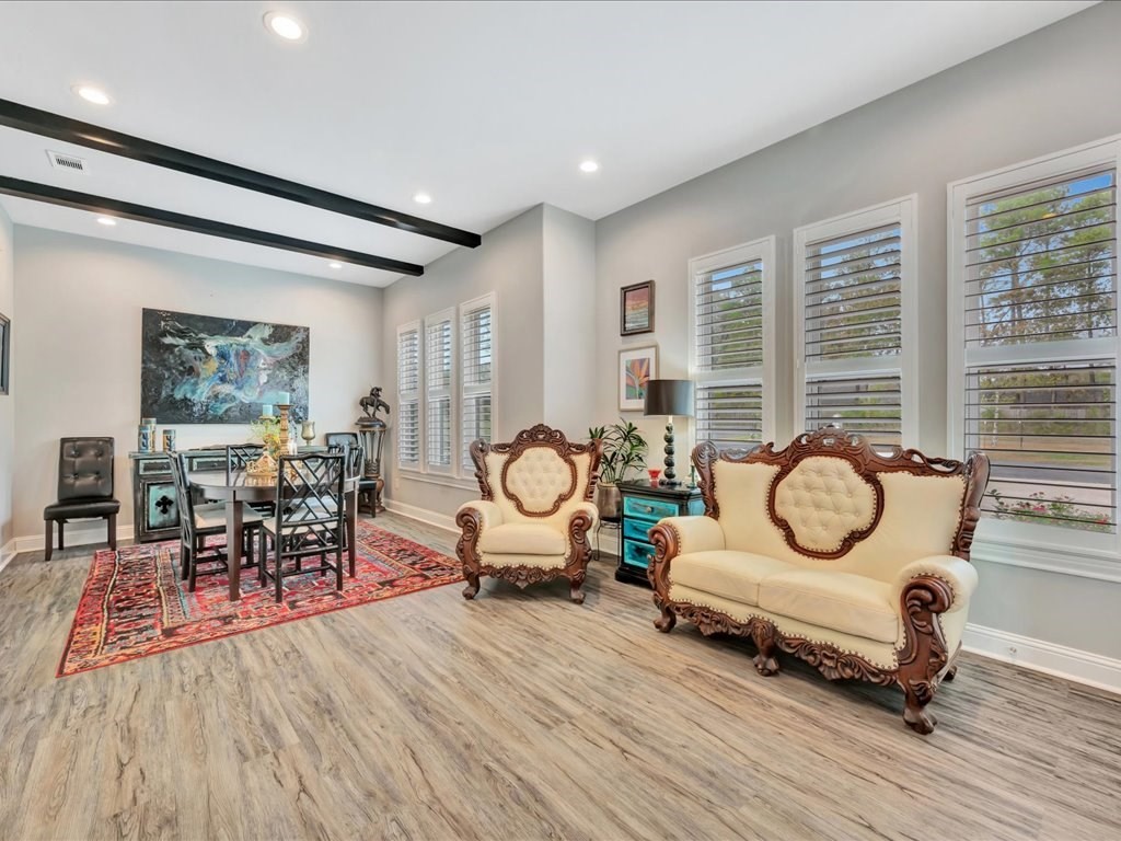 104 Wheeler Road Lufkin, TX 75901 - Photo 11 of 50 a living room with furniture gym equipment and a large window