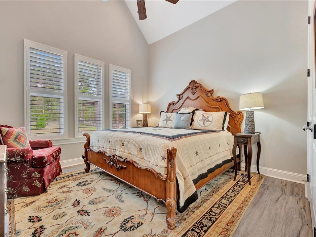 104 Wheeler Road Lufkin, TX 75901 - Photo 27 of 50 a bed sitting in a bedroom next to a window