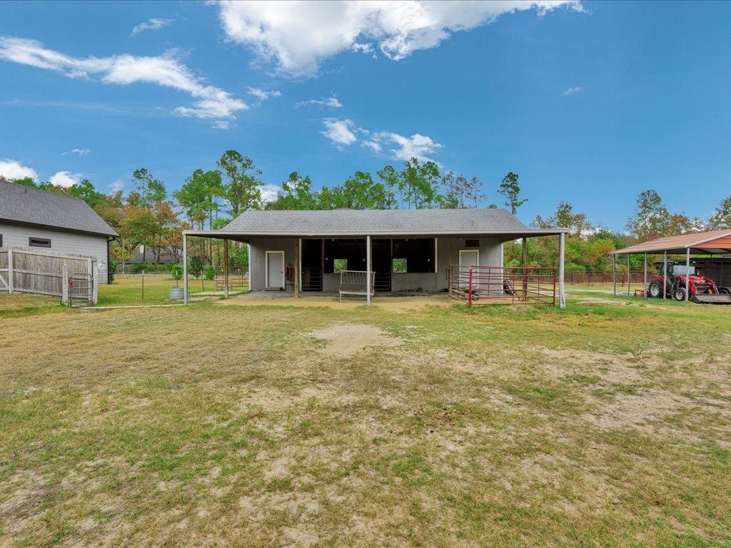 104 Wheeler Road Lufkin, TX 75901 - Photo 34 of 50 a front view of a house with a garden