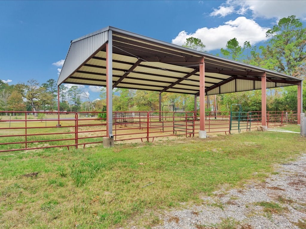 104 Wheeler Road Lufkin, TX 75901 - Photo 39 of 50 a view of a house with backyard and porch