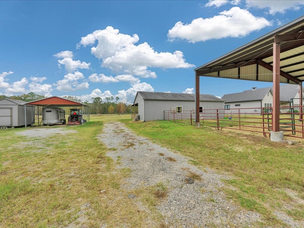 104 Wheeler Road Lufkin, TX 75901 - Photo 40 of 50 a view of a house with a yard