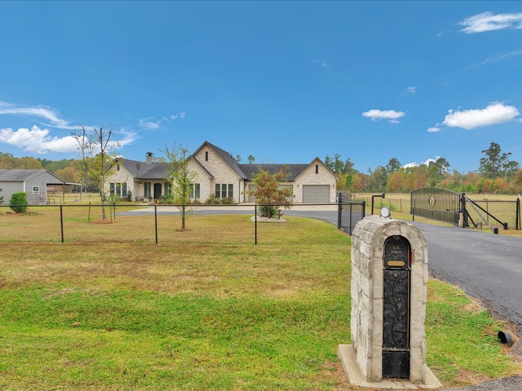 104 Wheeler Road Lufkin, TX 75901 - Photo 5 of 50 a view of a yard with a house