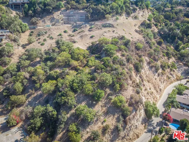 an aerial view of residential house with outdoor space