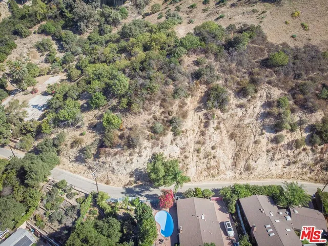 a view of backyard with outdoor space