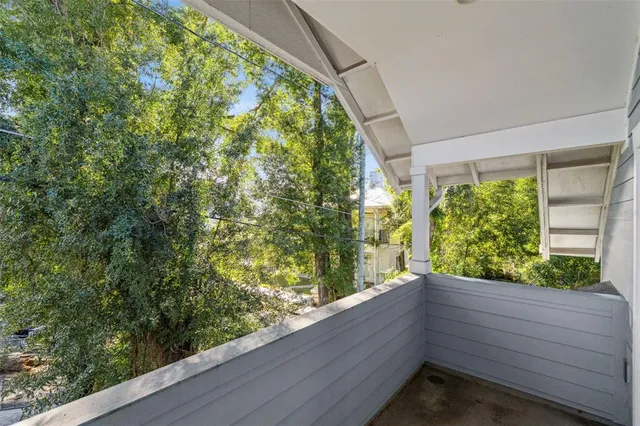 a bedroom with a bed furniture and a window