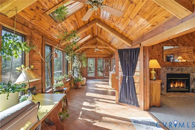 a front view of a house with outdoor seating