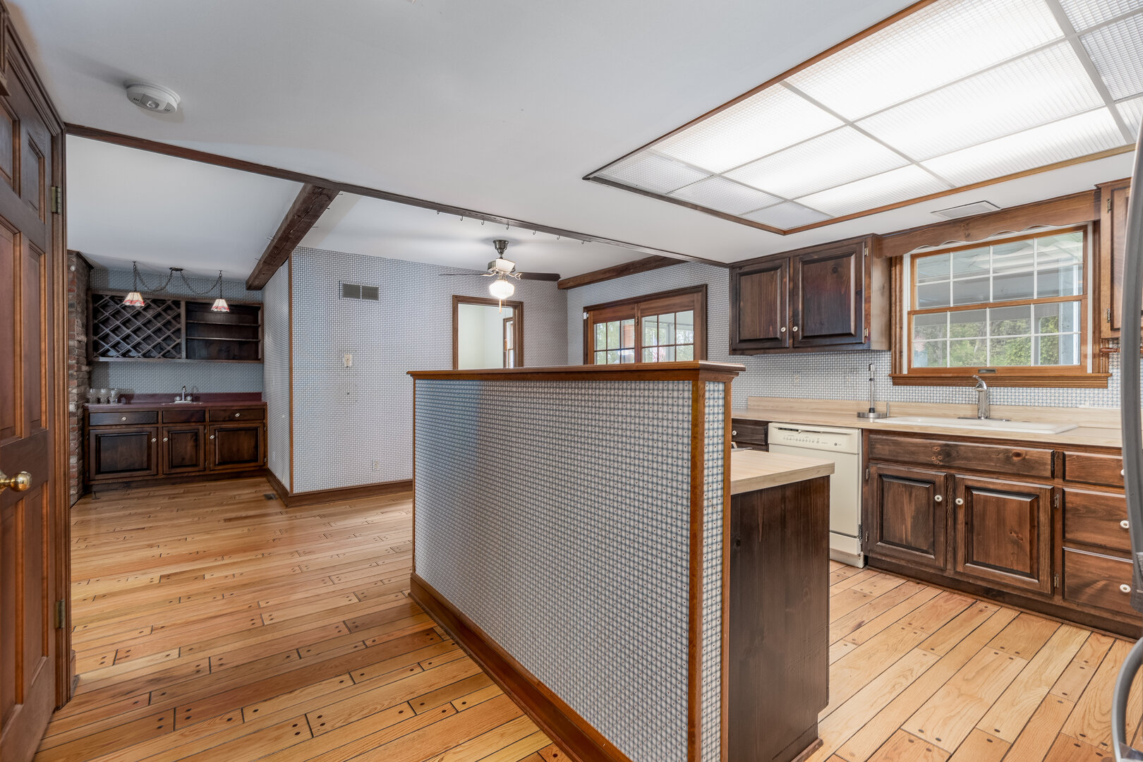 3094 East 1888th Road Ottawa, IL 61350 - Photo 12 of 43 a kitchen with stainless steel appliances granite countertop a stove cabinets and wooden floor