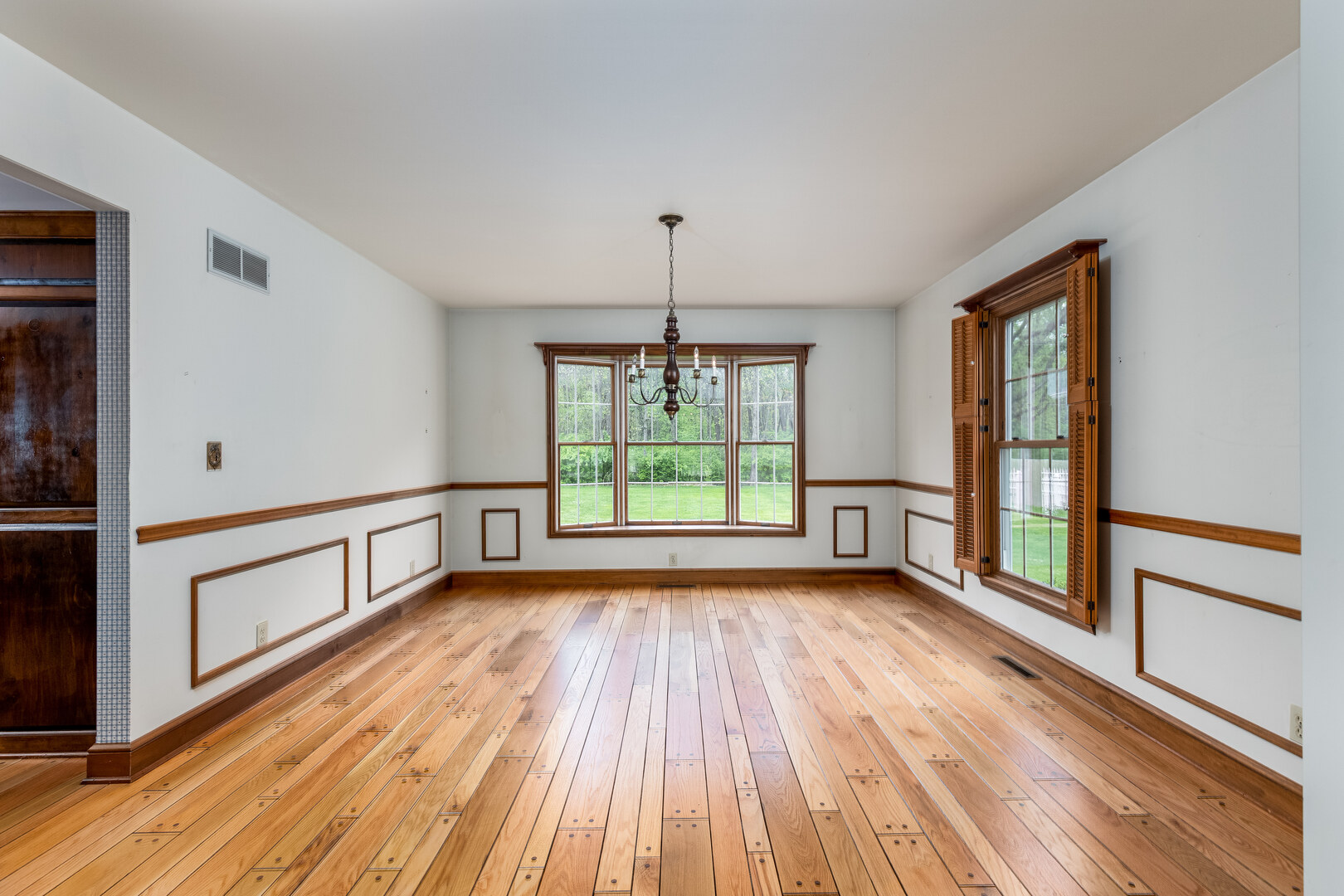 3094 East 1888th Road Ottawa, IL 61350 - Photo 15 of 43 a view of empty room with wooden floor and fan