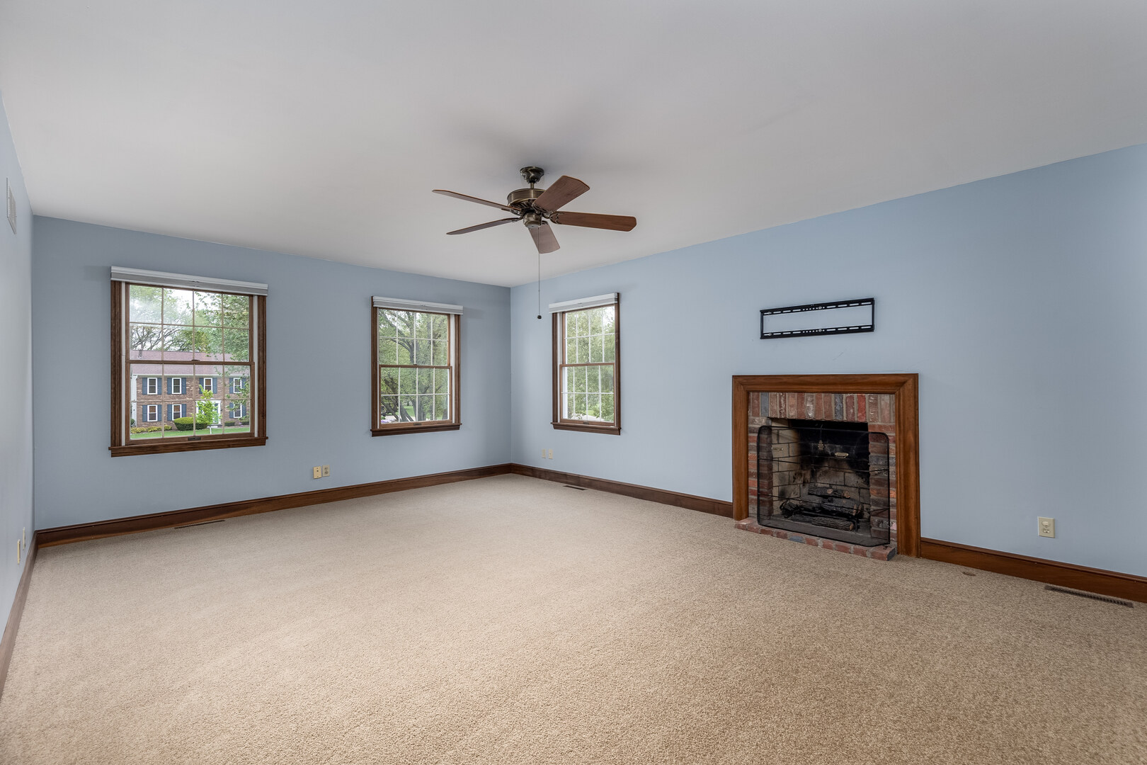 3094 East 1888th Road Ottawa, IL 61350 - Photo 18 of 43 an empty room with windows and fireplace
