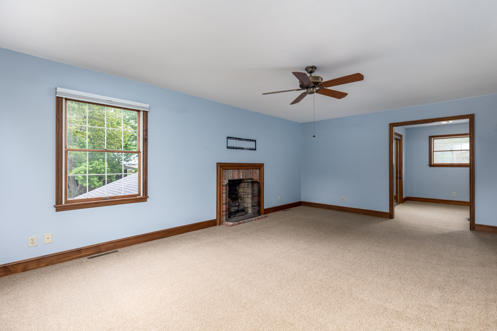 3094 East 1888th Road Ottawa, IL 61350 - Photo 19 of 43 an empty room with chandelier fan and windows