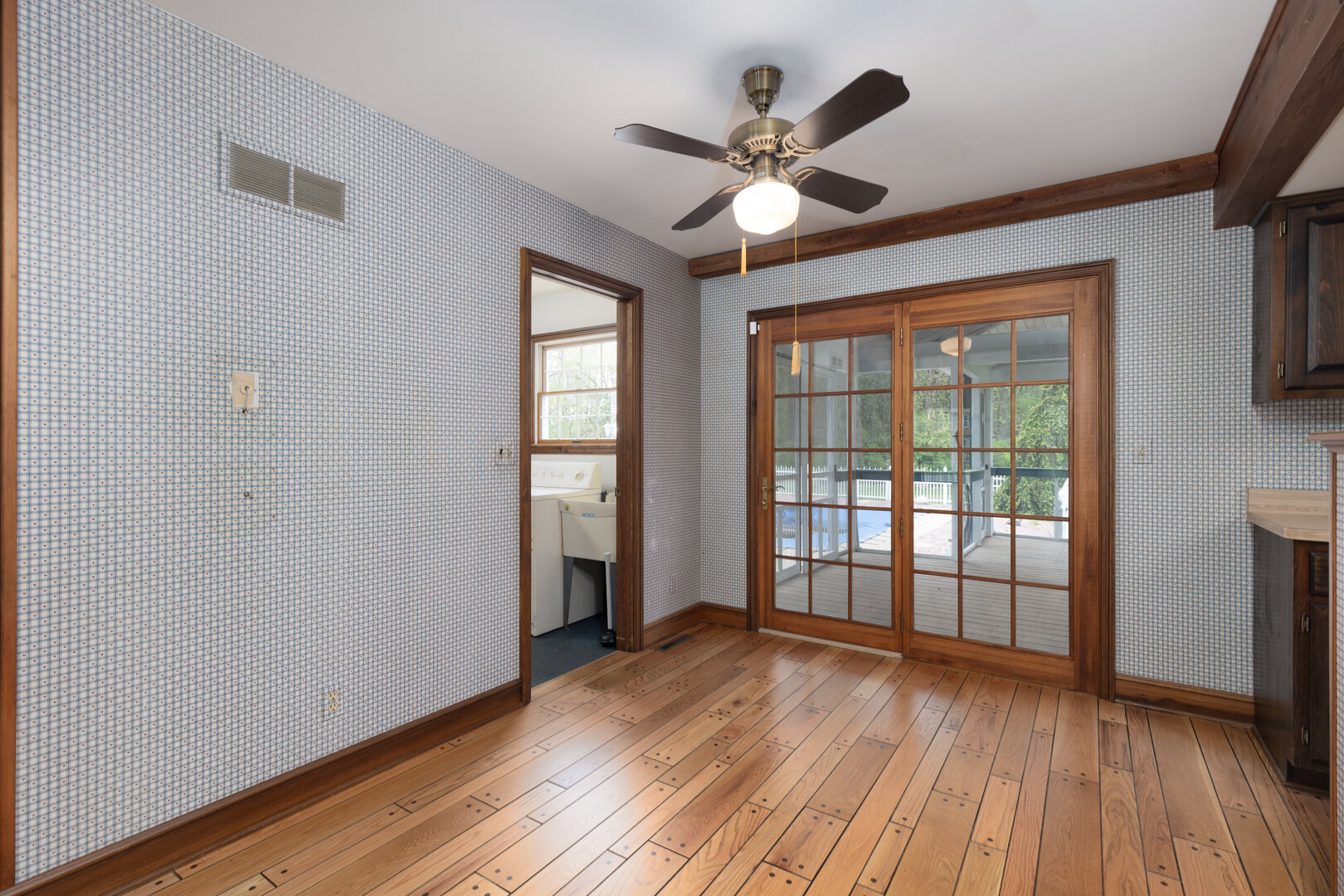 3094 East 1888th Road Ottawa, IL 61350 - Photo 8 of 43 a view of empty room with wooden floor and fan