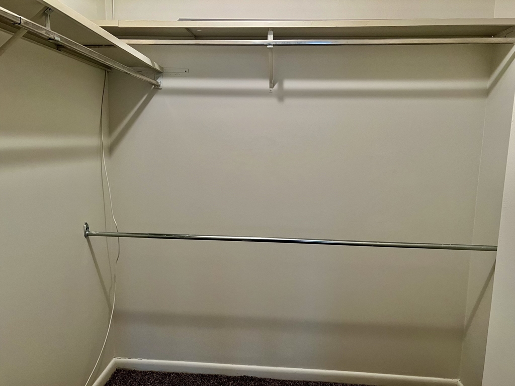 1004 Paradise Road, Unit 1L Swampscott, MA 01907 - Photo 24 of 28 a view of a rack