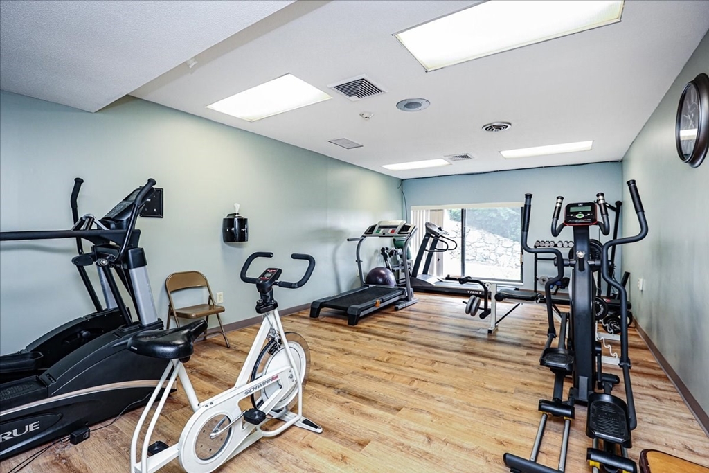1004 Paradise Road, Unit 1L Swampscott, MA 01907 - Photo 6 of 28 a view of a room with gym equipment