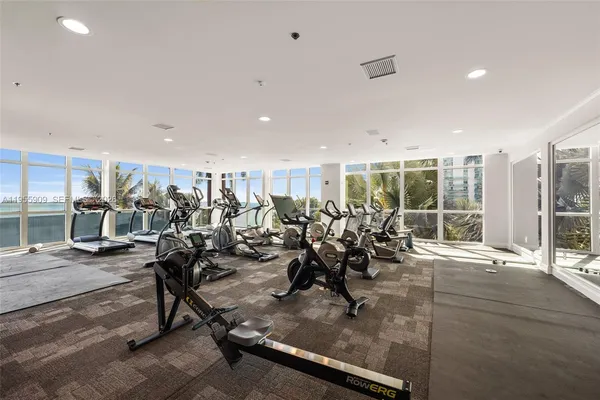 a lobby with furniture and book shelf