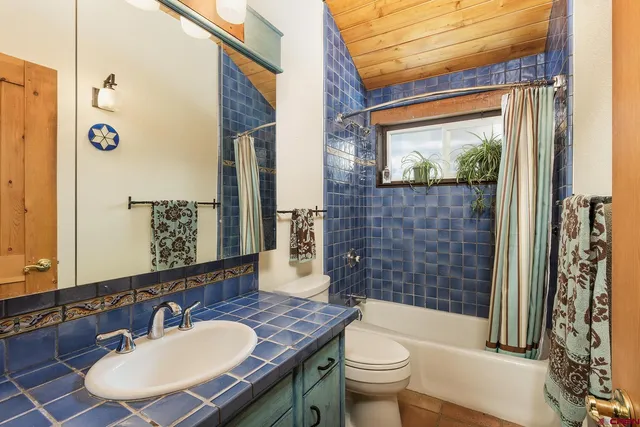 a room with furniture and a window