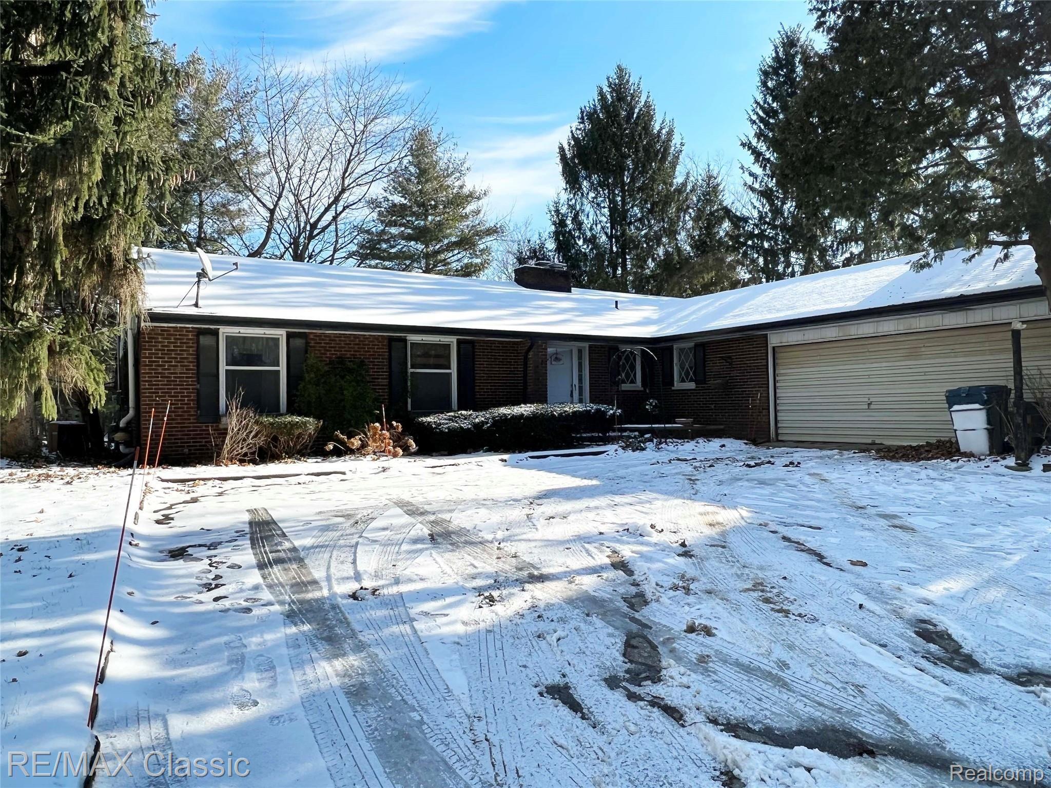 1753 Old Plank Road Milford, MI 48381 - Photo 1 of 32 1753 Old Plank Road Winter view