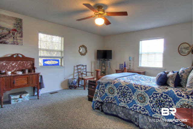 23220 T D Barnett Road Robertsdale, AL 36567 - Photo 12 of 24 master bedroom