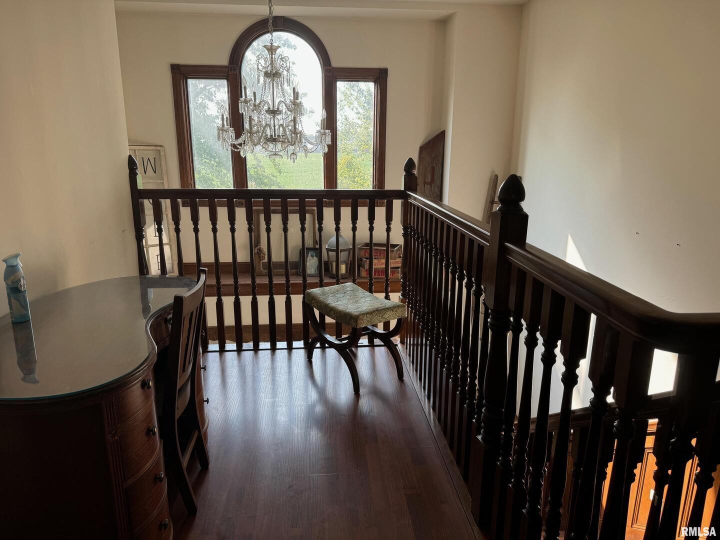 102 West North Street Benton, IL 62812 - Photo 40 of 56 a view of a dining room with furniture wooden floor and a chandelier