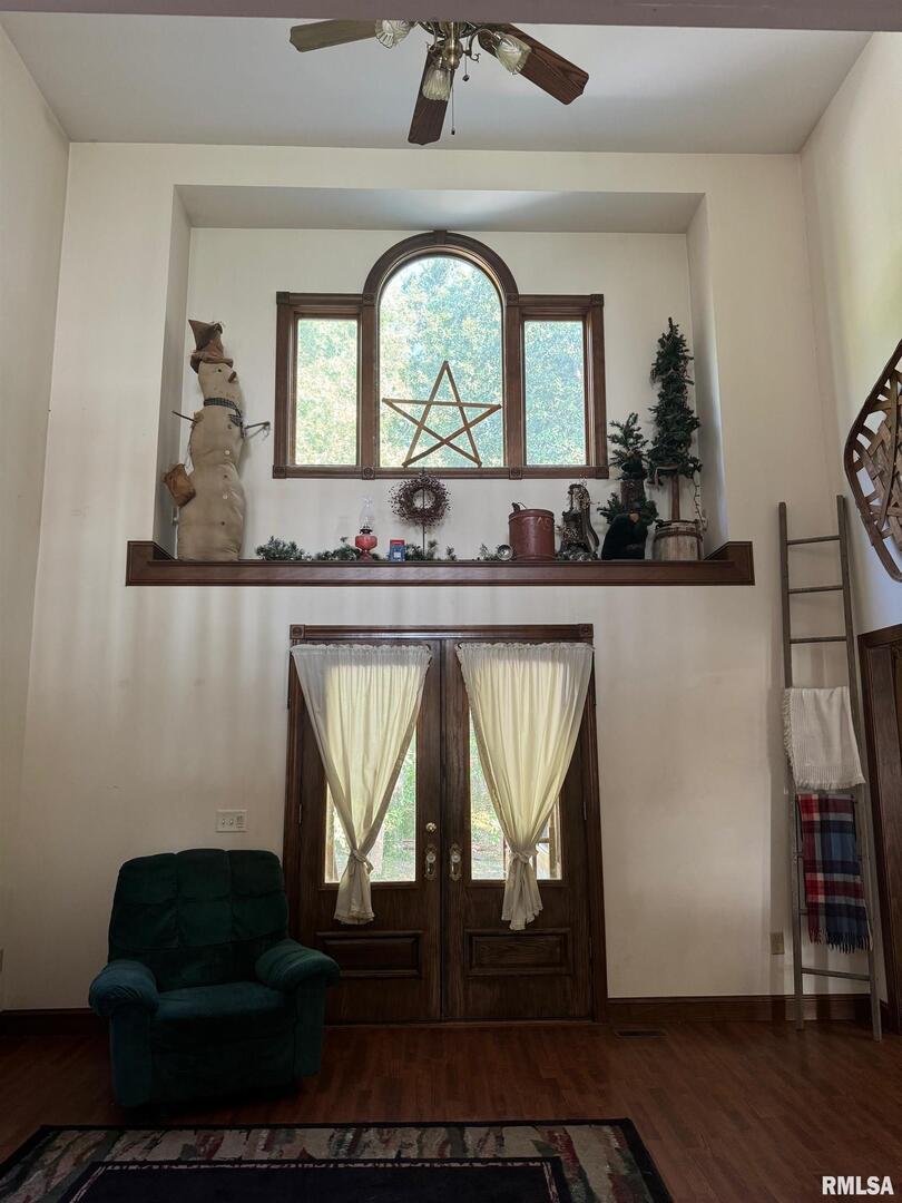 102 West North Street Benton, IL 62812 - Photo 44 of 56 a living room with a bed furniture and a large window