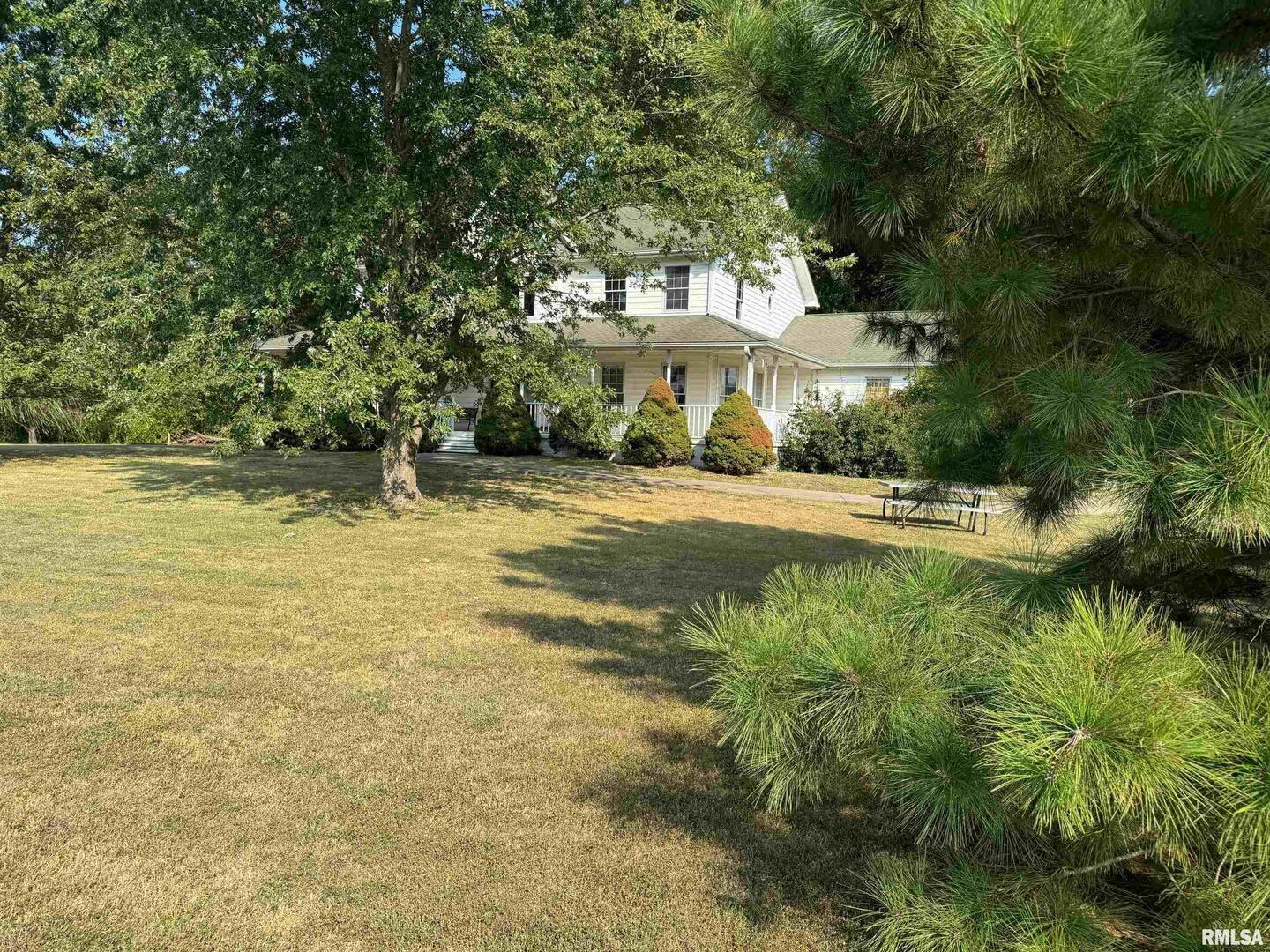 102 West North Street Benton, IL 62812 - Photo 6 of 56 a view of a house with a yard and a tree