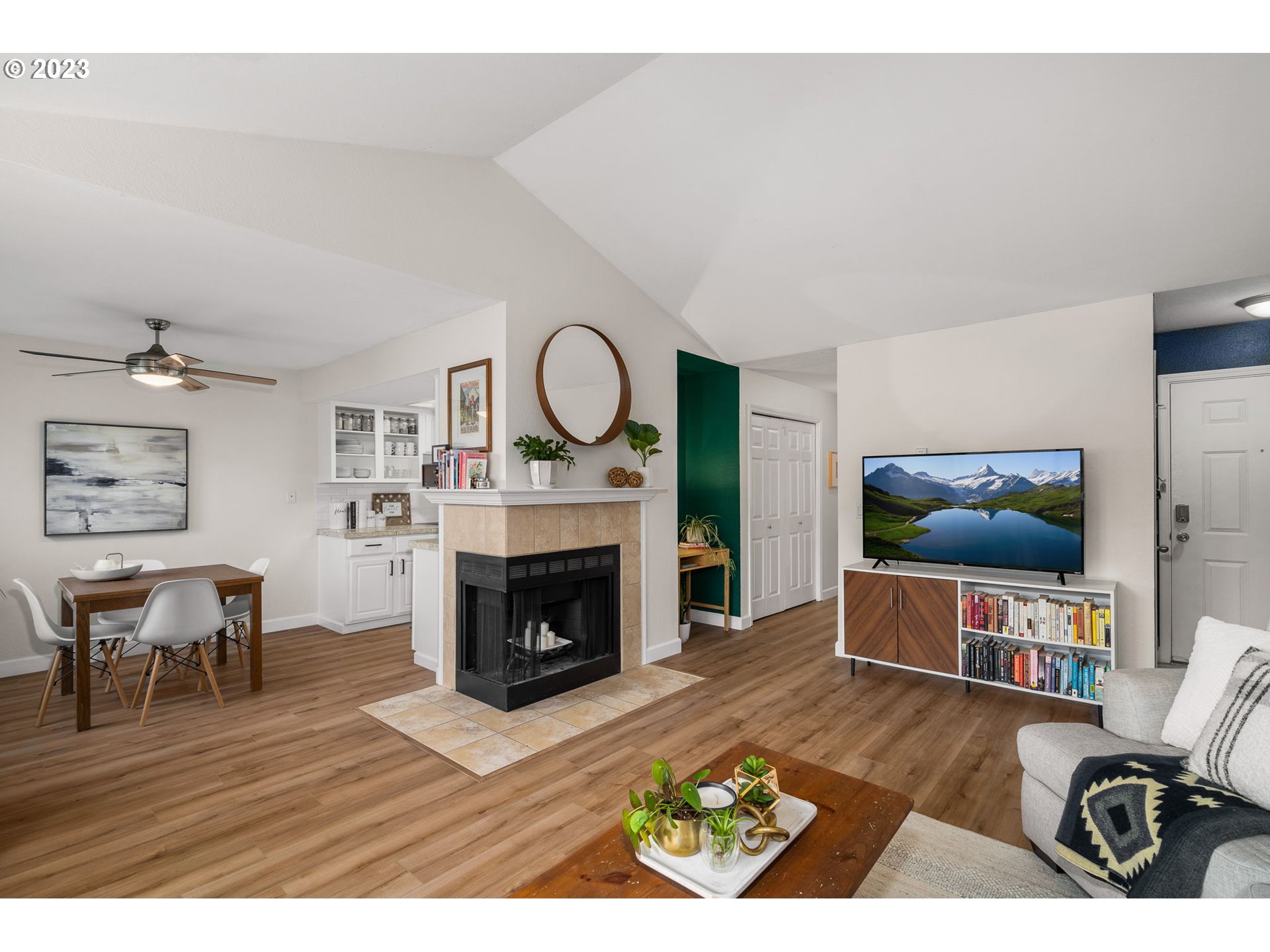 9340 Southwest 146th Terrace, Unit K7 Beaverton, OR 97007 - Photo 5 of 18 a living room with furniture and a fireplace